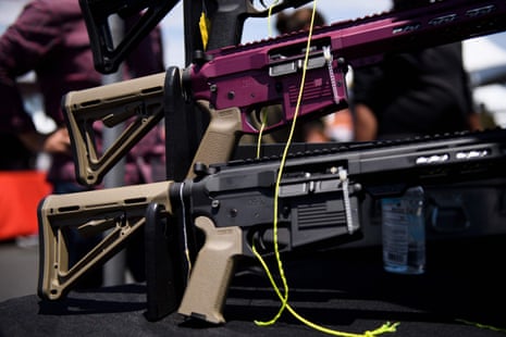 AR-15 style rifles are displayed for sale at a gun show in Costa Mesa, California, in 2021.