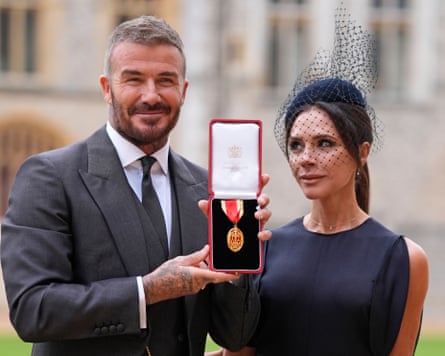 David Beckham, with his wife Victoria, after receiving his knighthood at an investiture ceremony at Windsor Castle