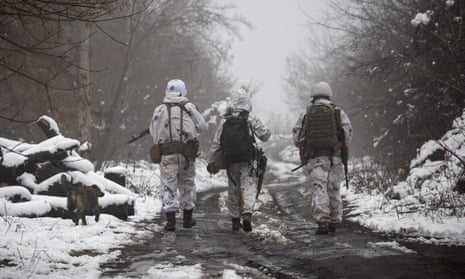 Ukrainian soldiers walks at the line of separation from pro-Russian rebels near Katerinivka, Donetsk region, Ukraine.