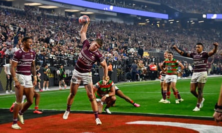 Sea Eagle Reuben Garrick celebrates his try against the Rabbitohs with a touchdown as rugby league launched its bid to win over America.