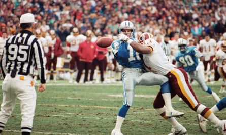 Washington defensive end Charles Mann slams into Detroit Lions quarterback Erik Kramer, causing a fumble in the 1991 playoffs