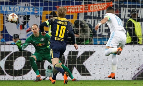 Marseille’s Dimitri Payet scores their fourth goal against RB Leipzig.