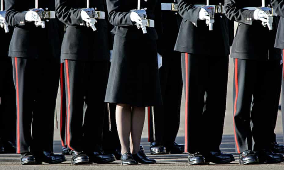 Male and female officer cadets at the passing out parade at Sandhurst royal military academy.