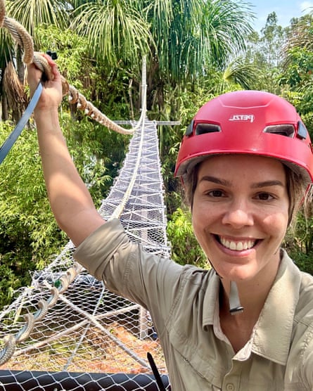Abra, wearing a protective helmet, poses at the end of one of the bridges