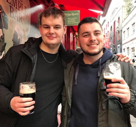 Tom Salter and Ben Early holding pints