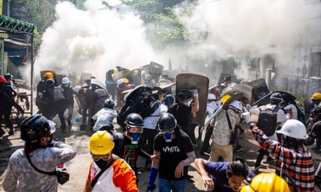 Police fire teargas at marchers in Yangon