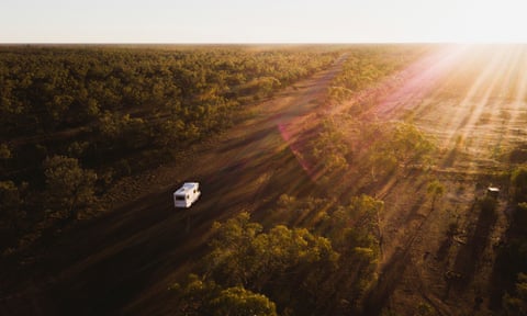 Campervan driving through the Outback near Lightning Ridge.