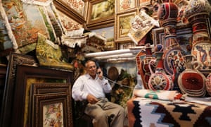 An Iranian shopkeeper waits for customers in Tehran’s Grand Bazaar. 4936.jpg?width=300&quality=85&auto=forma