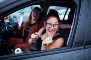 17 June – Visitors enjoying the first Bingo Bedlam, a socially distant drive-in bingo and singalong music session, held during a thunderstorm at Event City in Manchester
