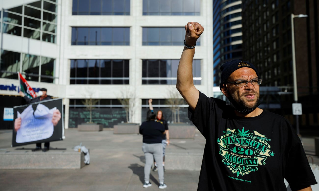 Chaz Neal outside the Hennepin county courthouse. ‘Seeing that video last year changed my life. I wanted to be a part of the solution instead of the problem.’