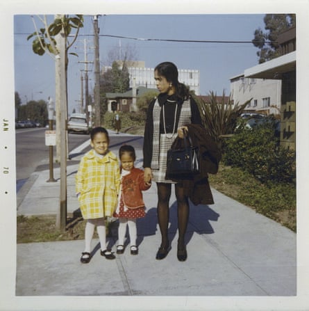 This January 1970 photo provided by the Kamala Harris campaign shows her, left, with her sister, Maya, and mother, Shyamala, outside their apartment in Berkeley, Calif., after her parents’ separation. (Kamala Harris campaign via AP)