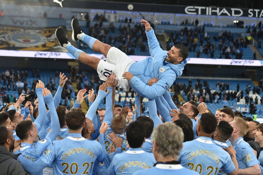 Manchester City legend Sergio Aguero is thrown up in the air by team-mates after his final league match for the newly-crowned champions.
