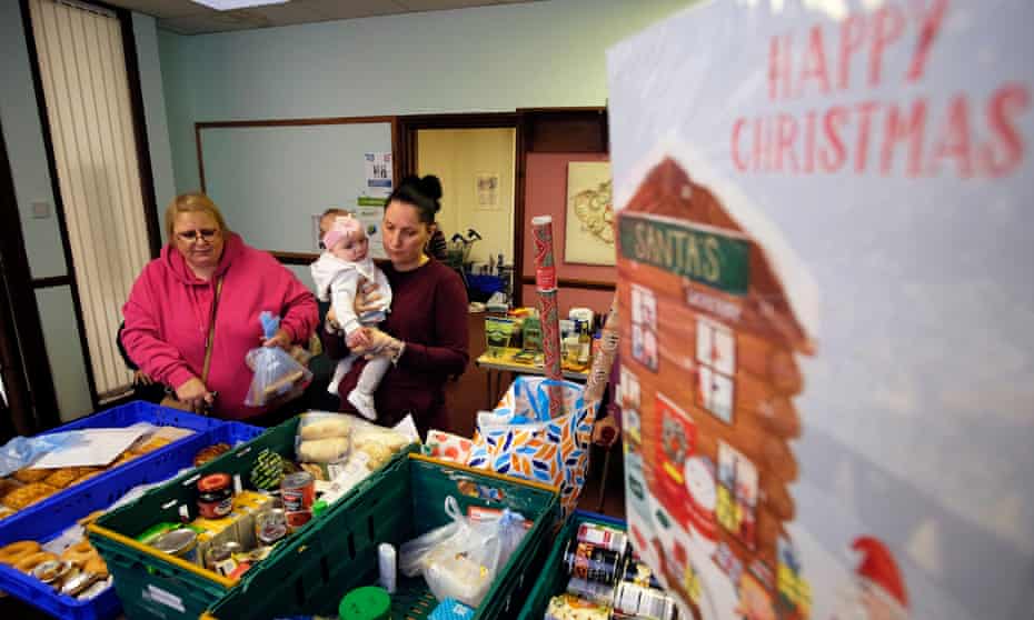 A family visits the Weston Favell food bank in Northampton.