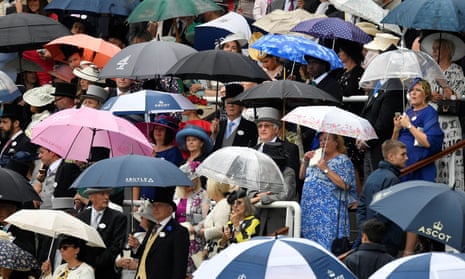 Rain in the paddock waiting for the Royal procession.