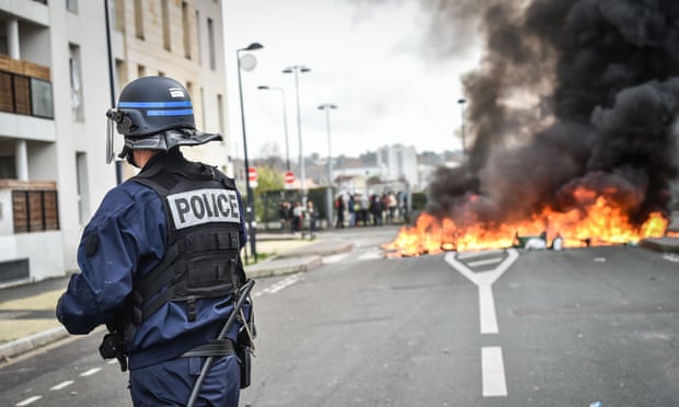 Students blockade the front of a Bordeaux high school during a protest against changes to education policy.