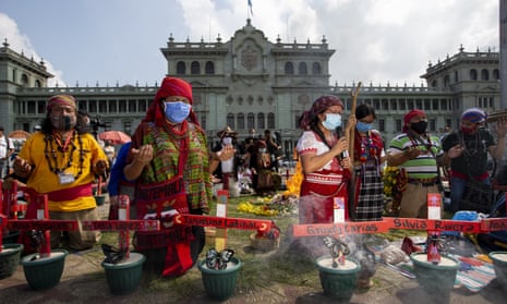 Mayan priests hold a ceremony in memorial of the late, well-known Mayan spiritual guide and natural medicine expert, Domingo Choc Che, in Constitution Plaza in Guatemala City, in 2020.