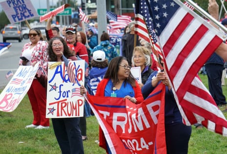Anchorage residents cheer on US President Donald Trump during a rally in Anchorage as he meets with Russian President Vladimir Putin to discuss a peace deal in the Russia Ukraine war.