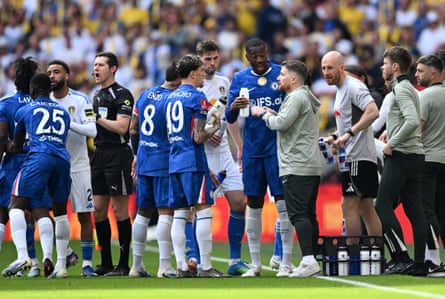 Calum McFarlane talks with his team in a drinks break during the FA Cup semi-final against Leeds.