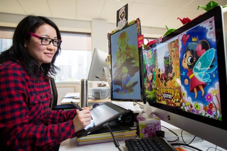 Digital artist and computer gamer Leonie Yue at her work desk in South Melbourne.