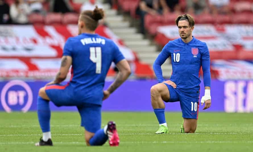 Kalvin Phillips and Jack Grealish take the knee before the friendly against Romania at the Riverside Stadium – a move which was booed by some fans.