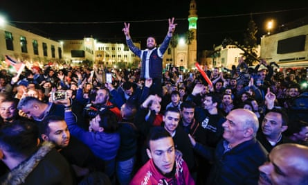 Palestinians celebrate Yaqoub Shaheen’s victory in Bethlehem on Saturday night.