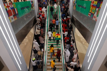 Fans take the stairs and escalators at Education City metro station before the South Korea v Ghana match.