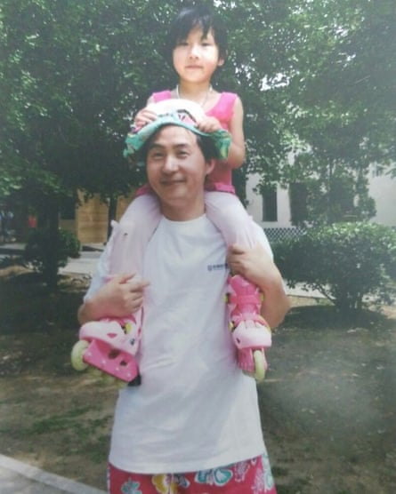 Li Heping pictured with his daughter.
