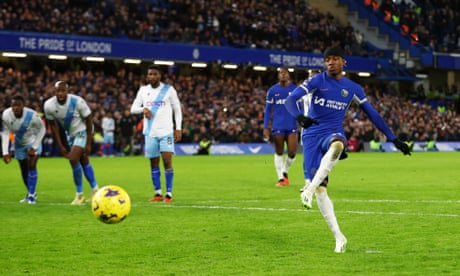 Chelsea's Noni Madueke scores from the penalty spot