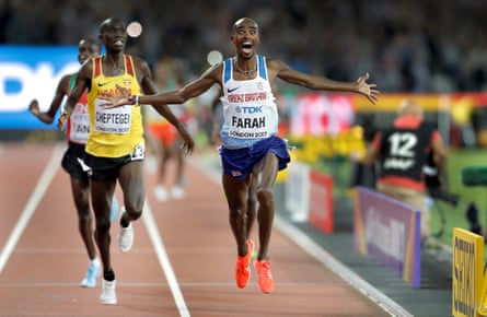Mo Farah crosses the line to win the 10,000m final.