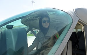 Afghanistan’s first female pilot, Niloofar Rahmani, 23, sits in a fixed-wing Afghan air force aviator aircraft in Kabul in 2015