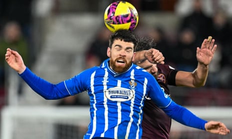 Hearts’ Robert Snodgrass and Kilmarnock's Liam Donnelly contest a header during a Premiership game in December