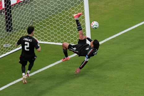 Mexico's Edson Alvarez clears with an overhead kick
