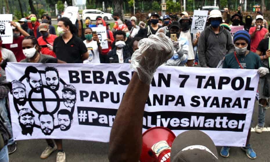 Papuan students hold a protest in Jakarta on 15 June demanding the government free seven Papuan activists who took part in anti-racism rallies.