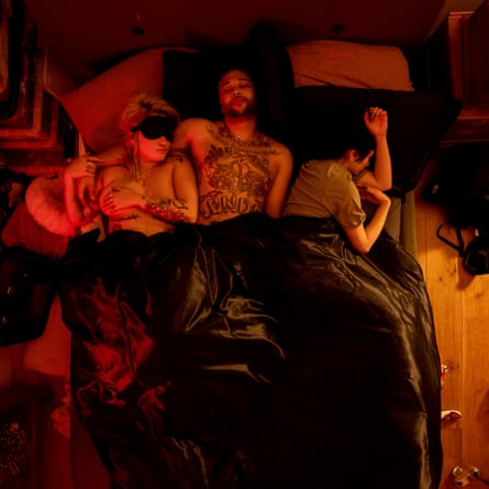 From left: Deeanne, Carter and Kyla in bed (time 05.39)
