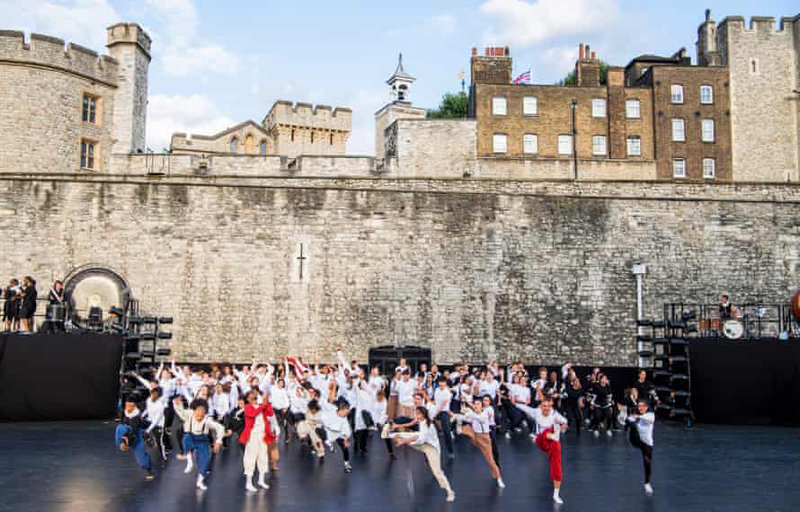 dancers and musicians fill the Tower of London moat for East Wall, directed by Hofesh Shechter, in 2018.