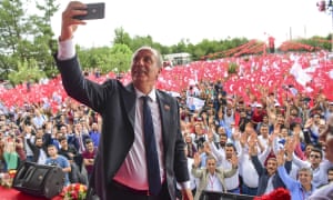 Muharrem İnce takes a selfie with supporters at an election rally in Diyarbakir.