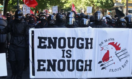 Demonstrators carry a banner reading ‘No more Proud Boys’ in Portland, Oregon.