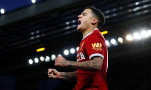 Philippe Coutinho celebrates after scoring Liverpool’s third goal.