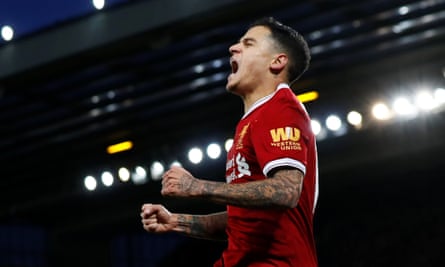 Philippe Coutinho celebrates after scoring Liverpool’s third goal.