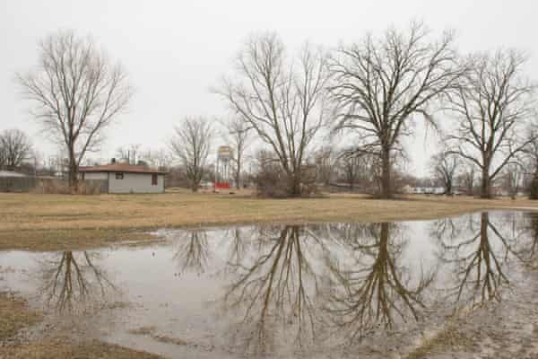 A view of a home with a waterlogged yard in the Piat Place neighborhood of Centreville, Il., on Saturday, Feb. 6, 2020. Since the block is at a lower elevation than the surrounding area, it floods faster.