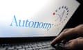 Fingers on keyboard with 'Autonomy' logo on screen