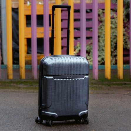 Mous hard-shell carry-on suitcase.