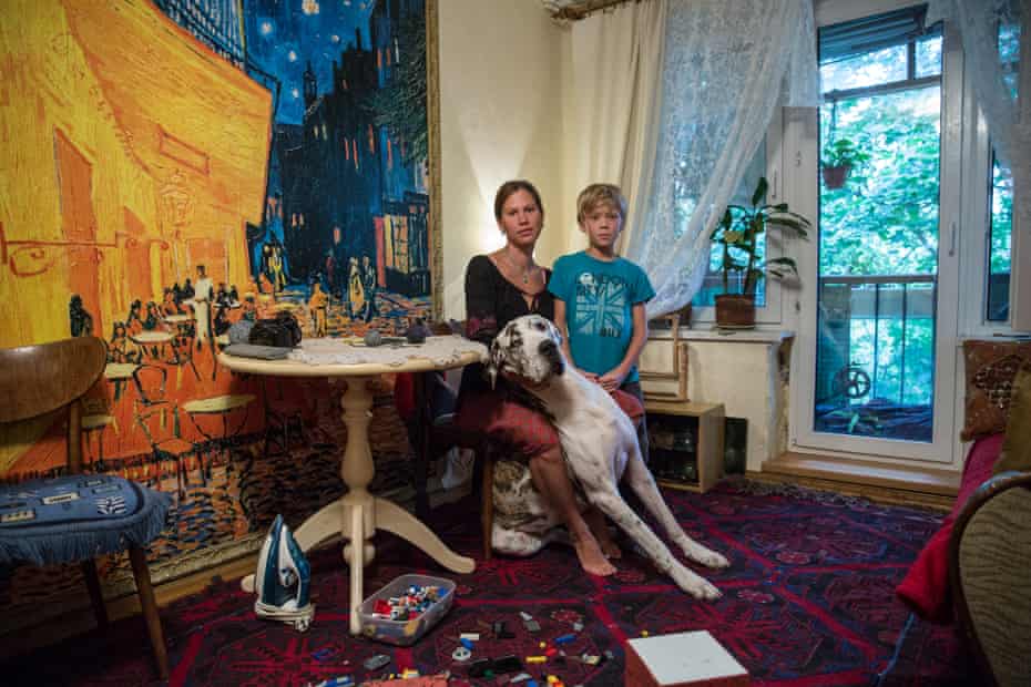 Disappearing Moscow Yulia and her son Maxim inside their family home scheduled for demolition. She fears they will be evicted and moved to a new neighbourhood away from friends and family