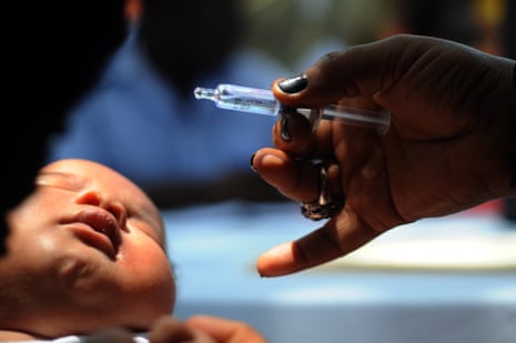 A nurse administers a rotavirus vaccine to a baby in Port-au-Prince, the Haitian capital, as part of a 2014 public health initiative