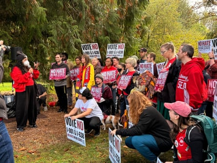 people holding signs