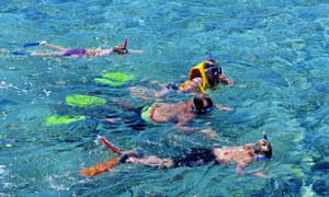 Snorkelling over Hardy Reef, Great Barrier Reef, Queensland.