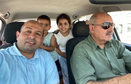Bassem Abudagga with Karim and Talya and his father in a car