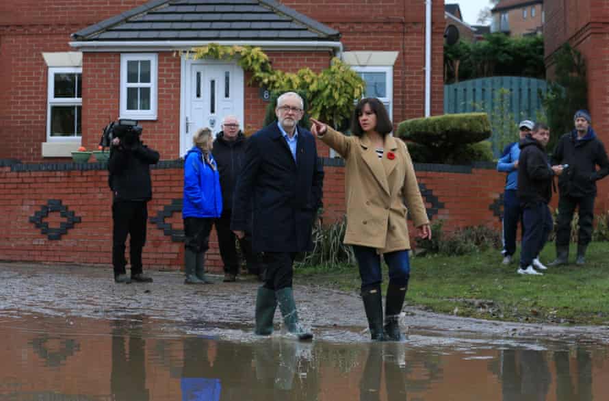 Jeremy Corbyn and Labour’s candidate for Don Valley Caroline Flint view the aftermath of flooding in Conisborough, near Doncaster.