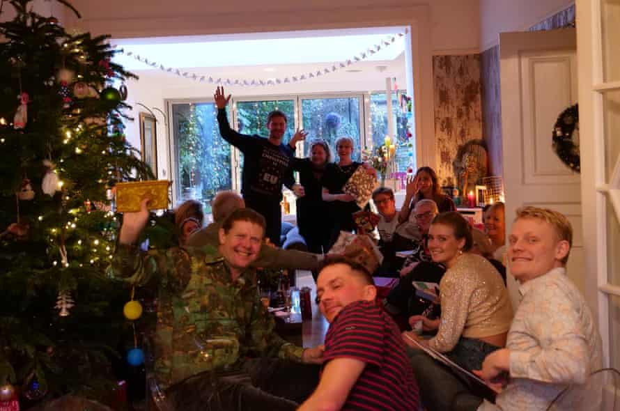 Peter Hanington (left) with friends and family at Christmas, in a snapshot taken by Ayman Alhussein, a Syrian refugee who was then staying with Hanington.