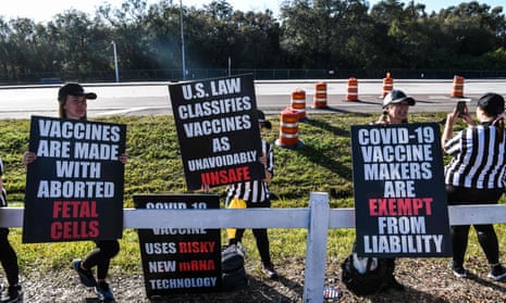 People protest against the Covid-19 vaccine in Tampa, Florida, on 7 February.
